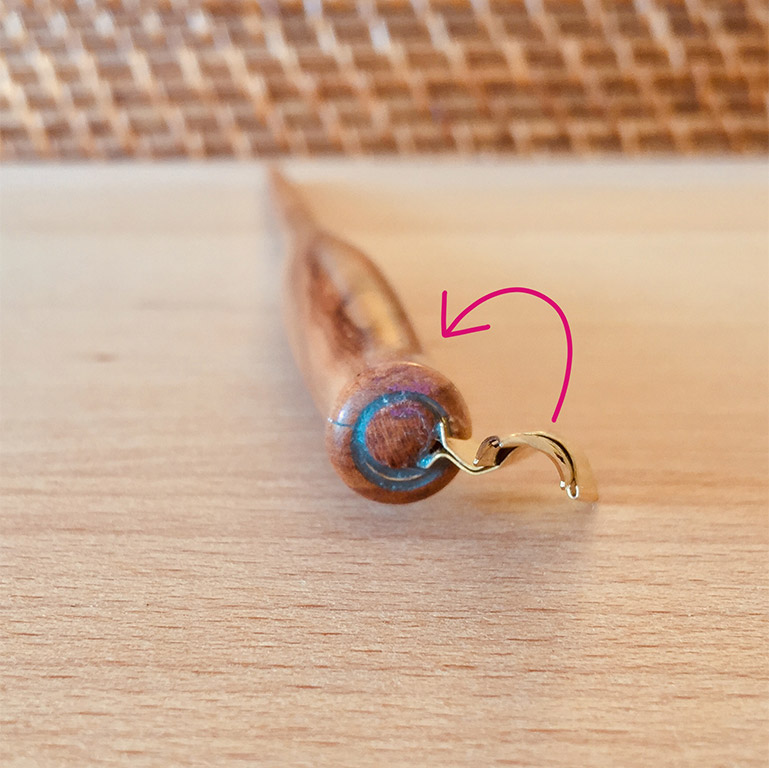 Photo of adjusting the roll of an oblique nib holder flange